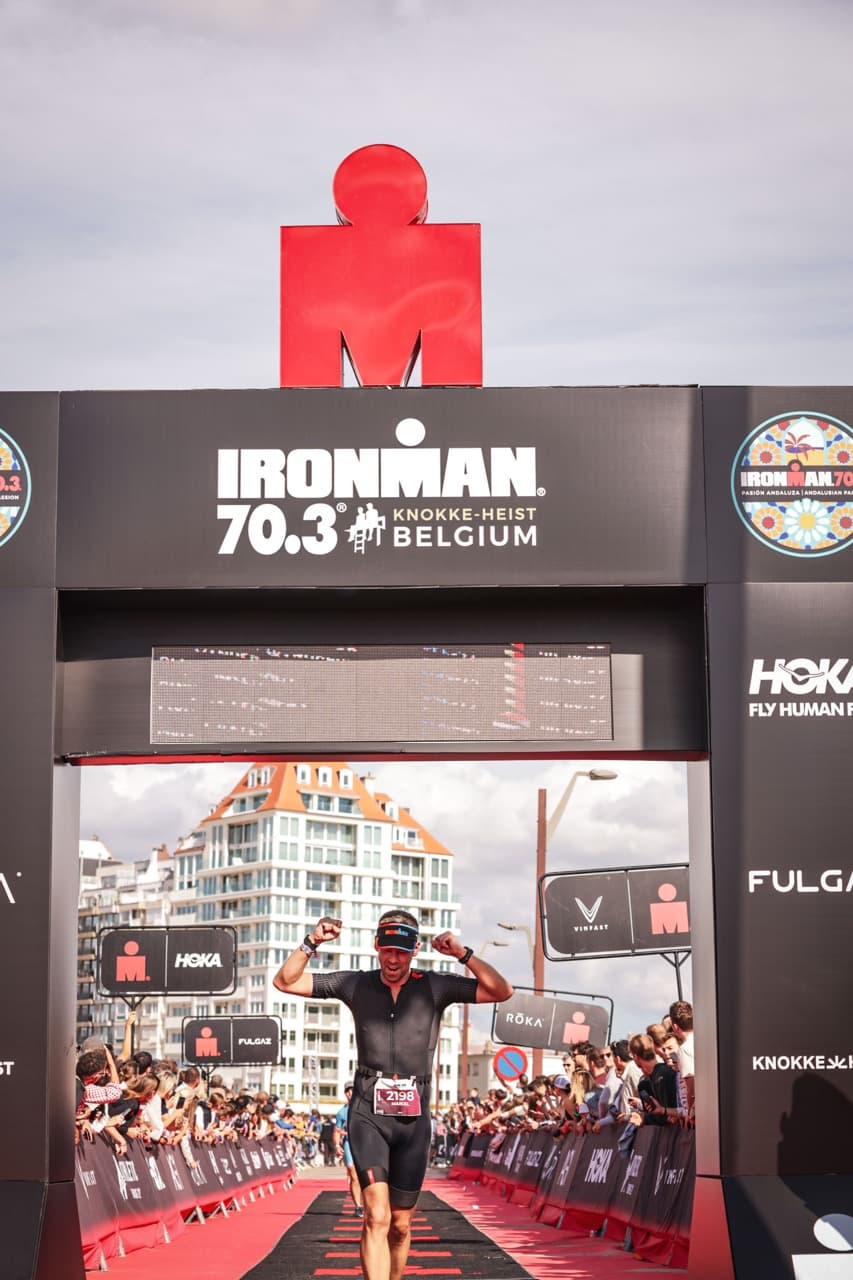 Crossing the finish line at Ironman 70.3 Knokke-Heist Belgium